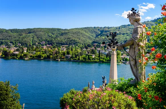 Isola Bella island and Lake Maggiore with statue and garden in Italy