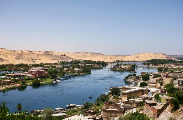 River Nile in Egypt with distant views of the desert sands