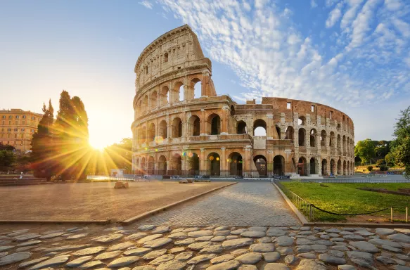 Colosseum in Rome lit by morning sunlight, Italy