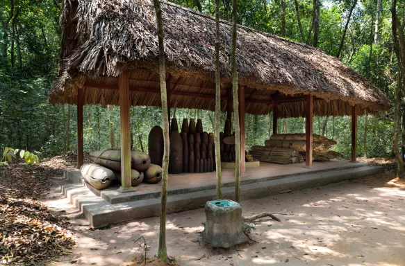 Sheltered war bombs and combat equipment at Cu Chi Tunnel in Vietnam