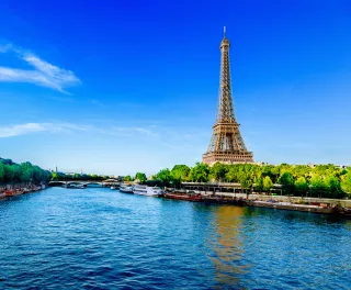 View of the Eiffel Tower and river Seine on a sunny day in Paris, France